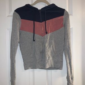 Blue, pink and gray cropped zip up. Gently used.
